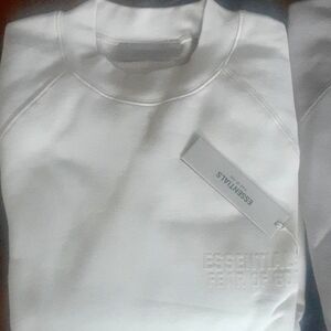 Brand New Women and men crew neck Essentials sweaters XS SIZE EGG SHELL COLOR